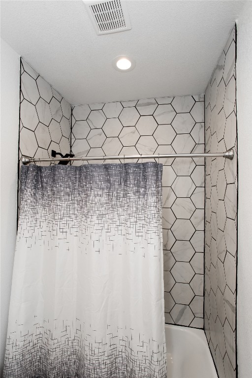 1215 Ridge Harbor Drive Spicewood, TX 78669 - Photo 32 of 39 a bathroom with a shower