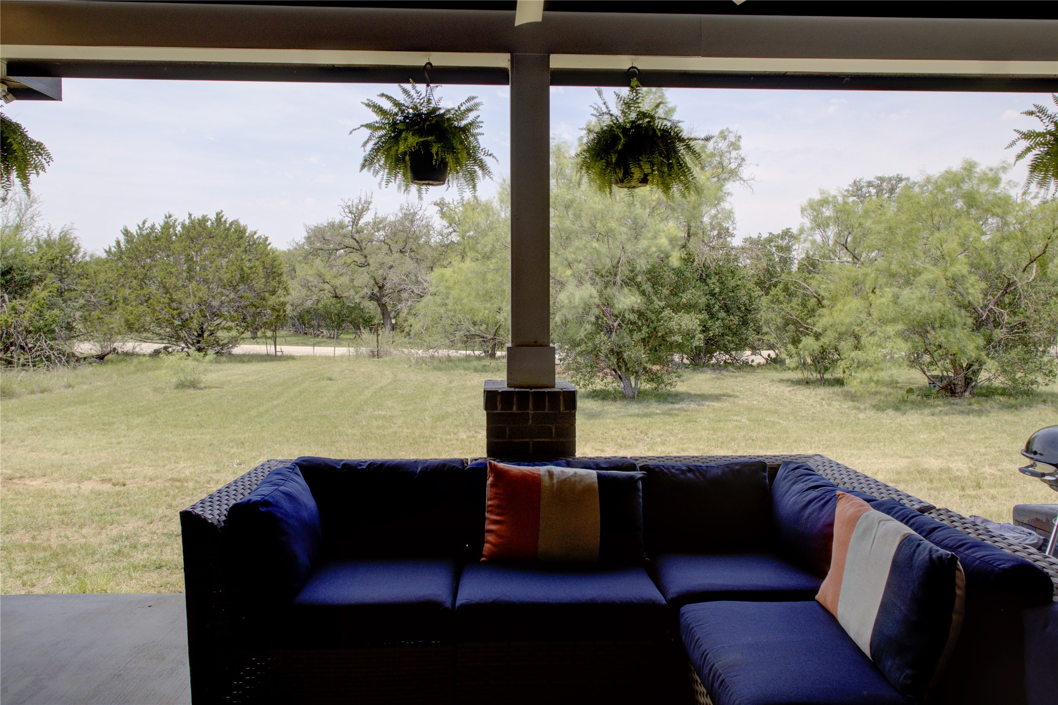 1215 Ridge Harbor Drive Spicewood, TX 78669 - Photo 33 of 39 a view of a lake with couches and city view