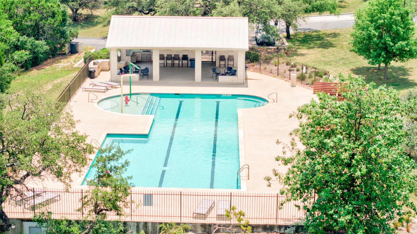 1215 Ridge Harbor Drive Spicewood, TX 78669 - Photo 37 of 39 an aerial view of a house with swimming pool and patio