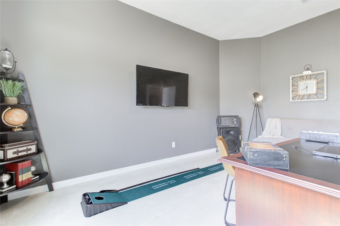 1215 Ridge Harbor Drive Spicewood, TX 78669 - Photo 8 of 39 a living room with furniture and a flat screen tv