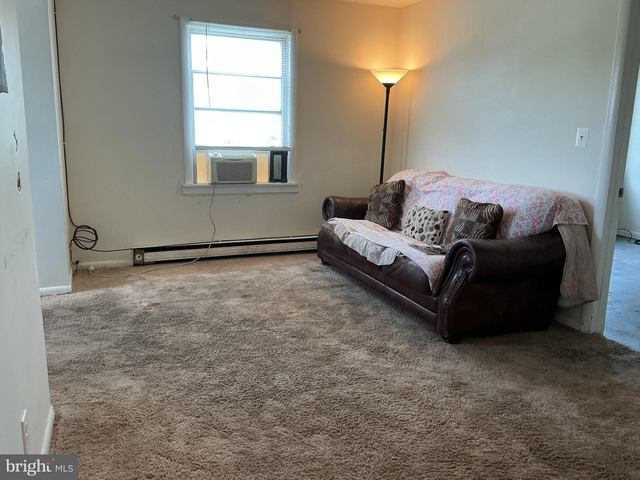 6 Post Road, Unit E Aberdeen, MD 21001 - Photo 6 of 11 Cozy living space with natural light.