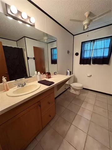 a bathroom with a double vanity sink and mirror