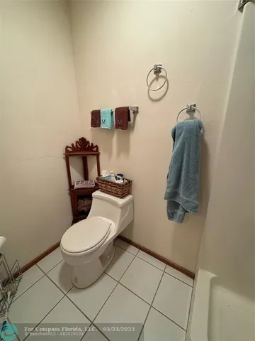 a bathroom with a toilet and a sink