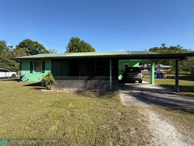 a view of a house with patio