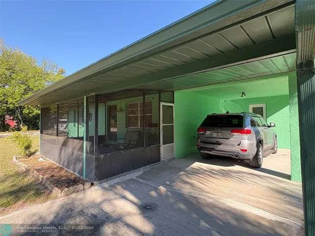 a view of a car in front of a house
