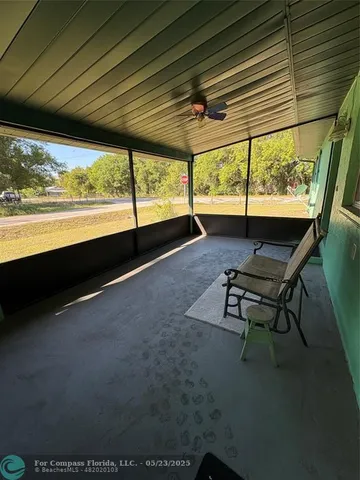 a living room with a large window