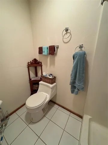a bathroom with a toilet and a sink
