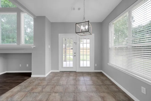 a view of a kitchen with a sink and a stove top oven