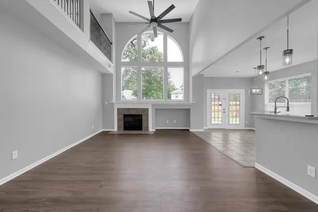 a bathroom with a double vanity sink and mirror