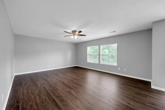 a bathroom with a sink a mirror and a shower