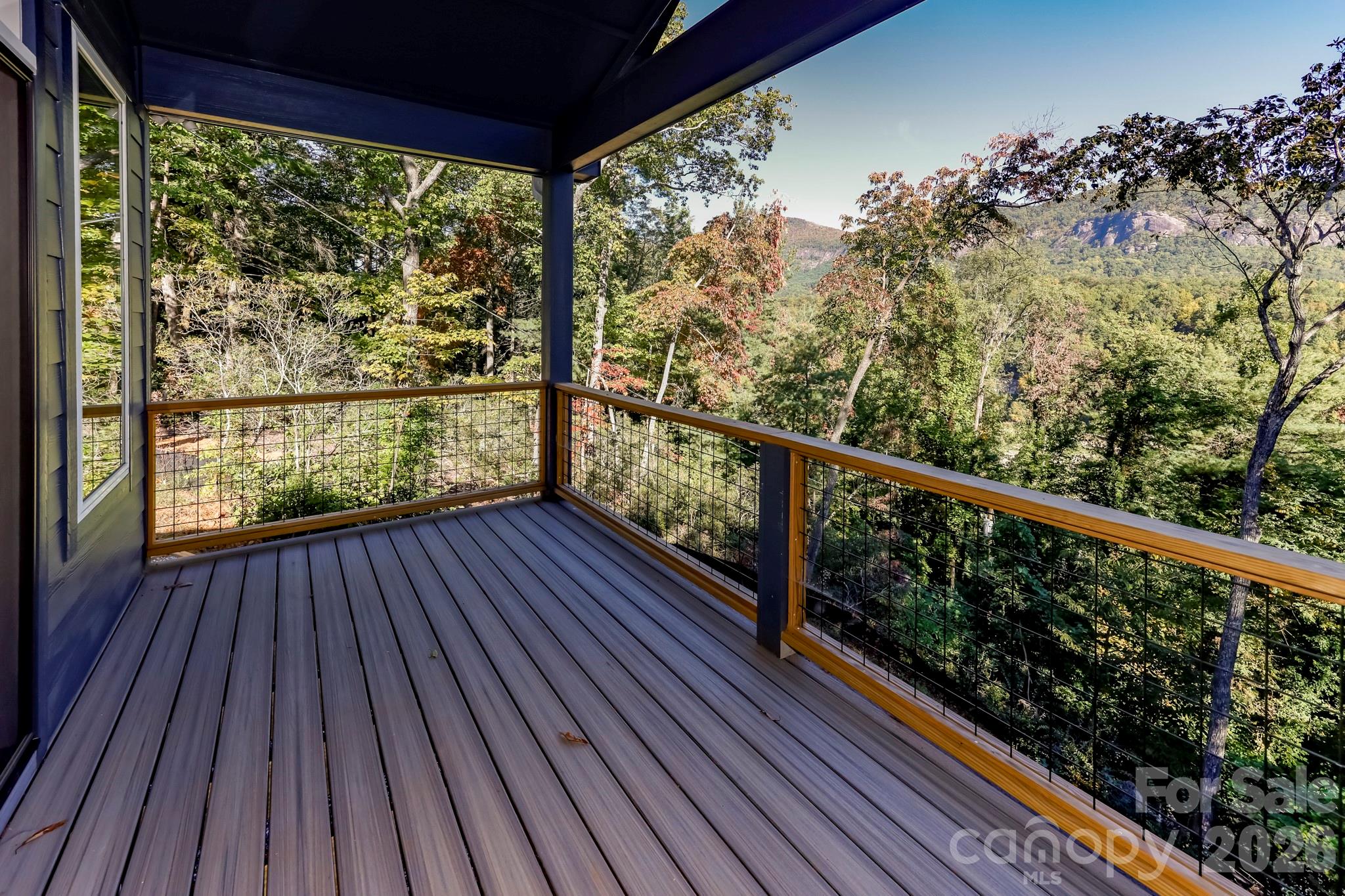 272 Seton Road Lake Lure, NC 28746 - Photo 32 of 39 a view of balcony with wooden floor