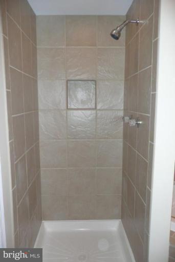 3717 Ridgecroft Road Baltimore, MD 21206 - Photo 10 of 17 a bathroom with a shower