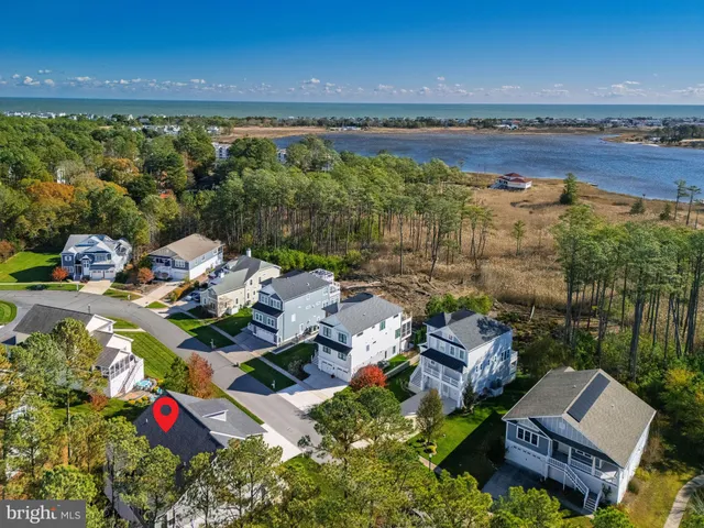 an aerial view of a house with a garden