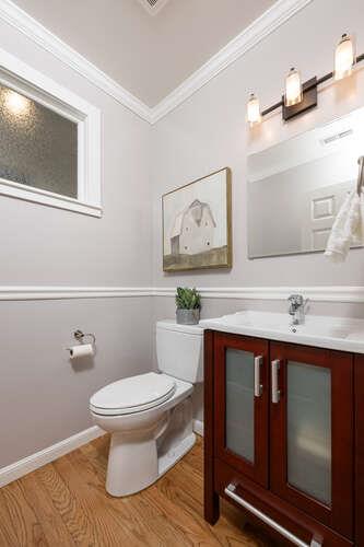 108 Ware Road Woodside, CA 94062 - Photo 17 of 56 a bathroom with a toilet a sink and mirror
