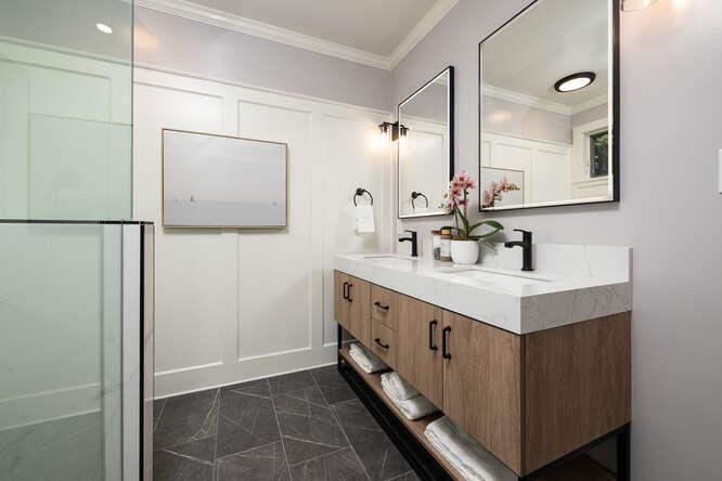 108 Ware Road Woodside, CA 94062 - Photo 27 of 56 a bathroom with a double vanity sink and mirror