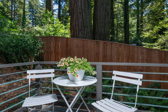 108 Ware Road Woodside, CA 94062 - Photo 29 of 56 a view of a table and chairs in the patio