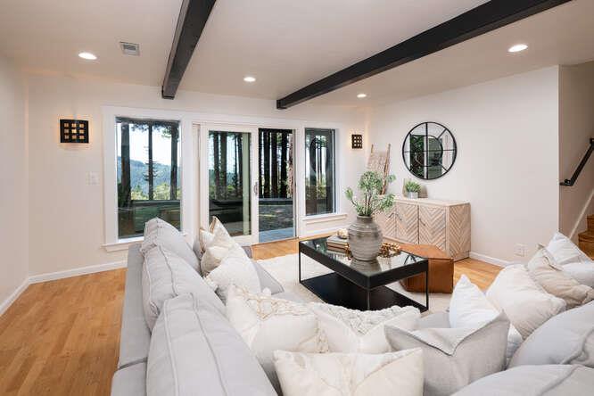 108 Ware Road Woodside, CA 94062 - Photo 31 of 56 a living room with furniture and floor to ceiling windows