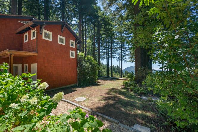 108 Ware Road Woodside, CA 94062 - Photo 51 of 56 a front view of a house with a yard