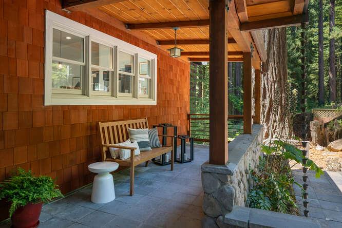 108 Ware Road Woodside, CA 94062 - Photo 6 of 56 a view of a patio with chairs and potted plants