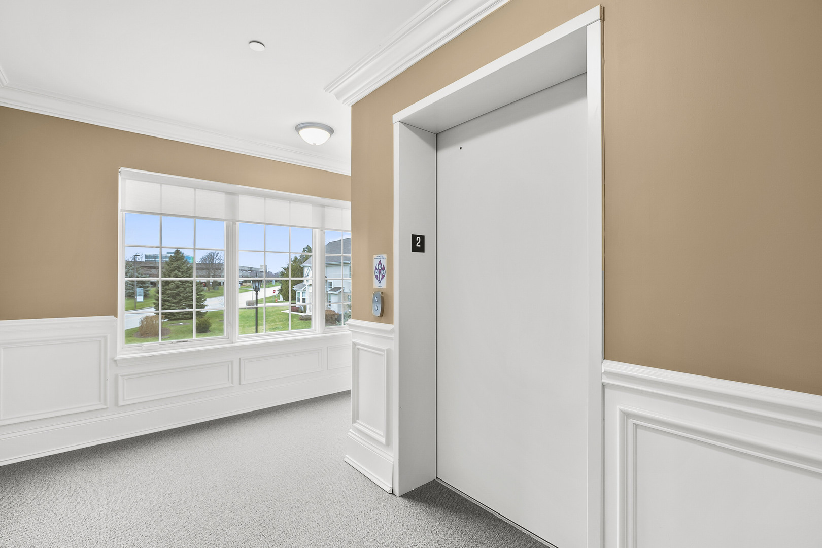 401 West Pierce Road, Unit 201 Itasca, IL 60143 - Photo 2 of 24 a view of room with window and front door