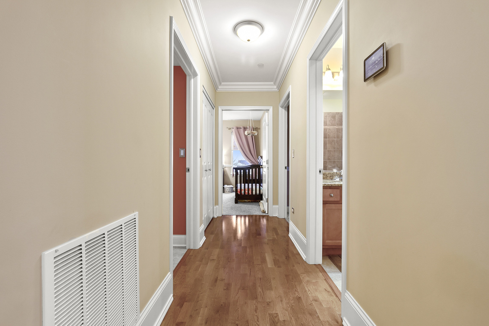 401 West Pierce Road, Unit 201 Itasca, IL 60143 - Photo 11 of 24 a view of a hallway view with wooden floor and staircase