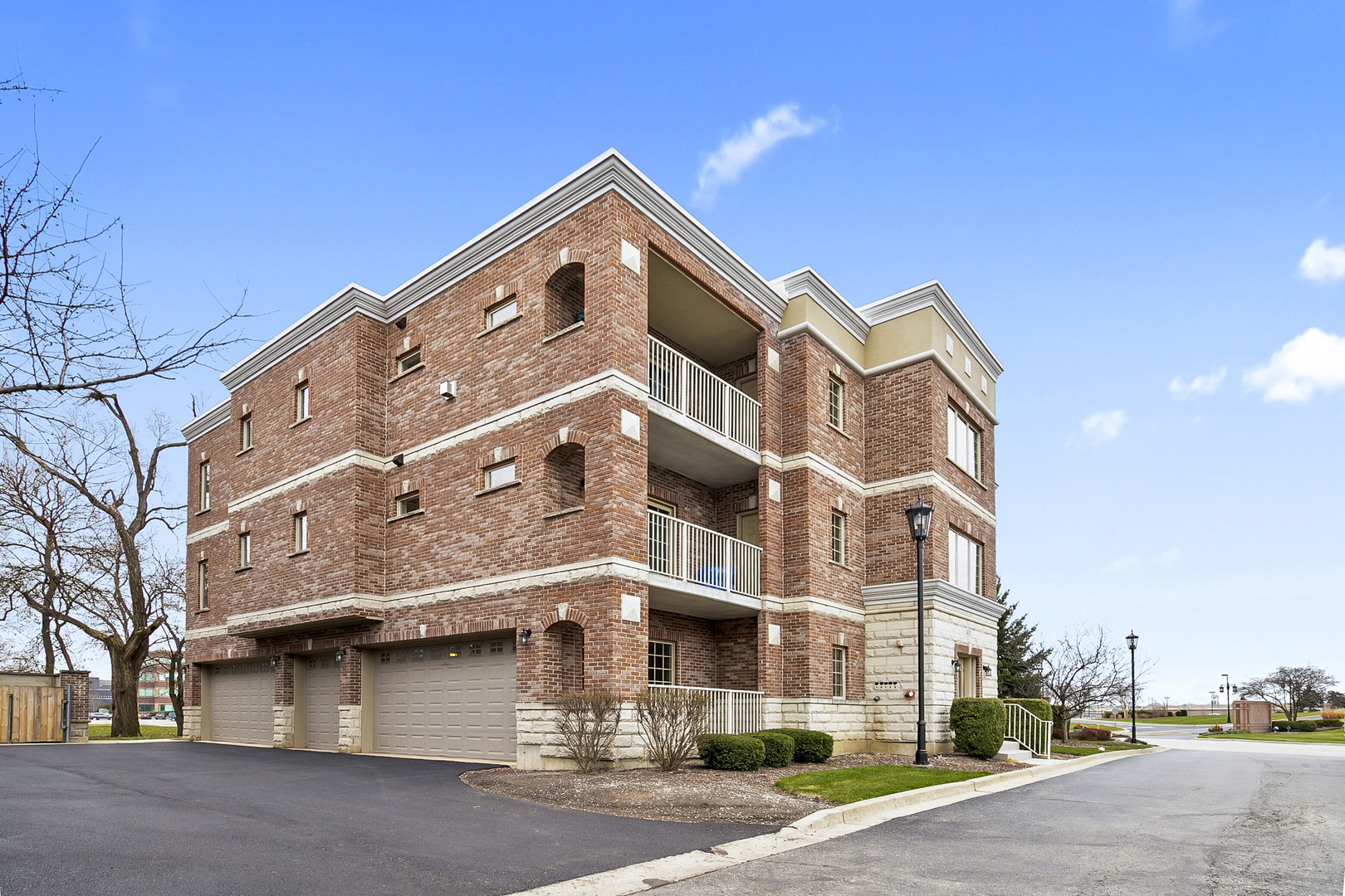 401 West Pierce Road, Unit 201 Itasca, IL 60143 - Photo 23 of 24 a view of a building with a street