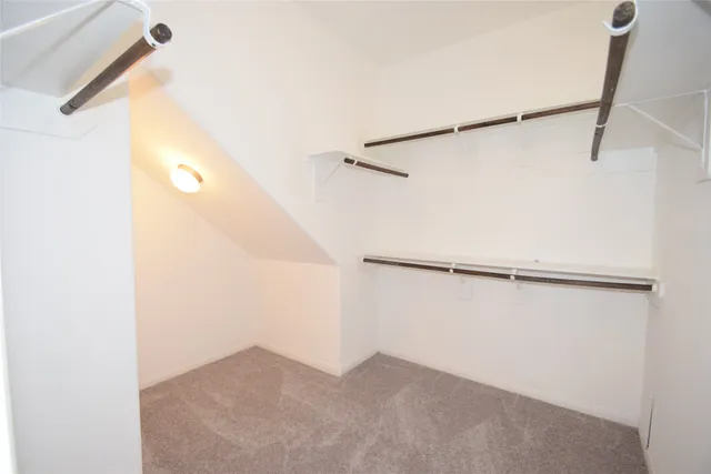 a view of small space with racks on the wall