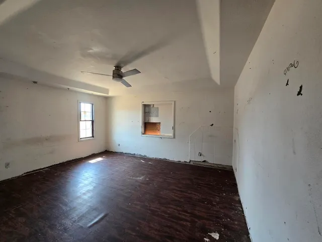 a bathroom with a bathtub and a sink