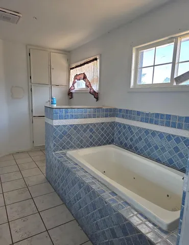 a view of a door with wooden floor