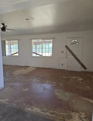 an empty room with windows