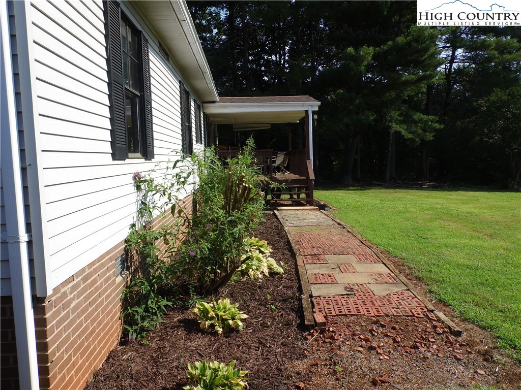 1475 Ferguson Drive Clemmons, NC 27012 - Photo 20 of 35 a front view of a house with garden