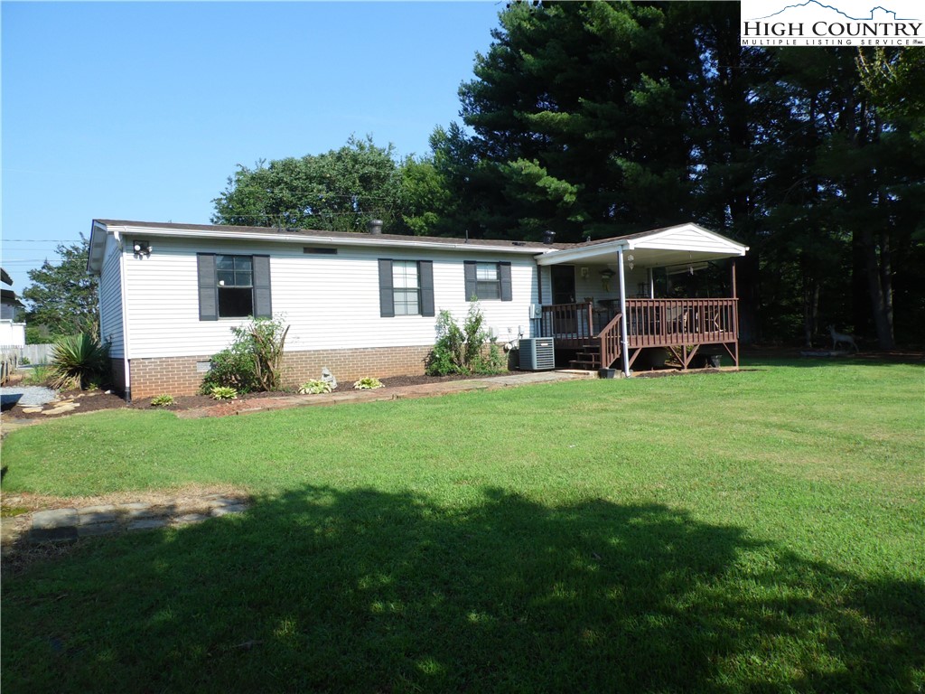1475 Ferguson Drive Clemmons, NC 27012 - Photo 24 of 35 a view of a house with a yard and sitting area