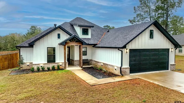 a view of bathroom and shower