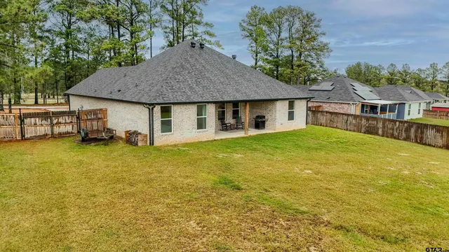 a house view with a garden space