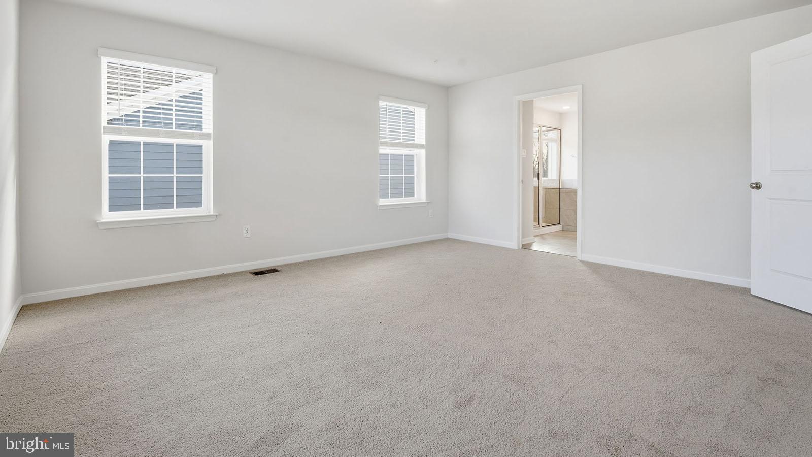 8110 Cypress Pt Drive Rosedale, MD 21237 - Photo 24 of 37 an empty room with windows