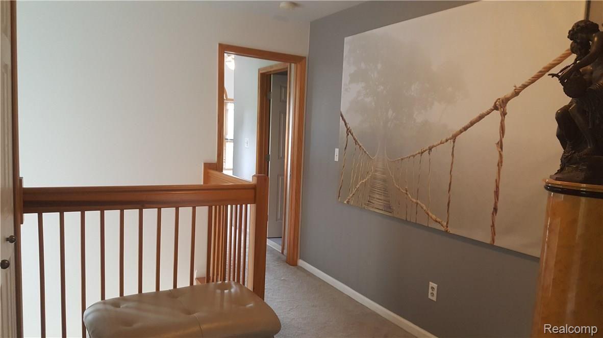 27830 Reo Road Grosse Ile, MI 48138 - Photo 20 of 31 Open upstairs hallway.