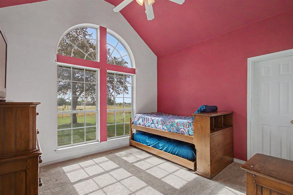 483 Christy Kay Lane Rhome, TX 76078 - Photo 21 of 40 a bedroom with furniture and a window