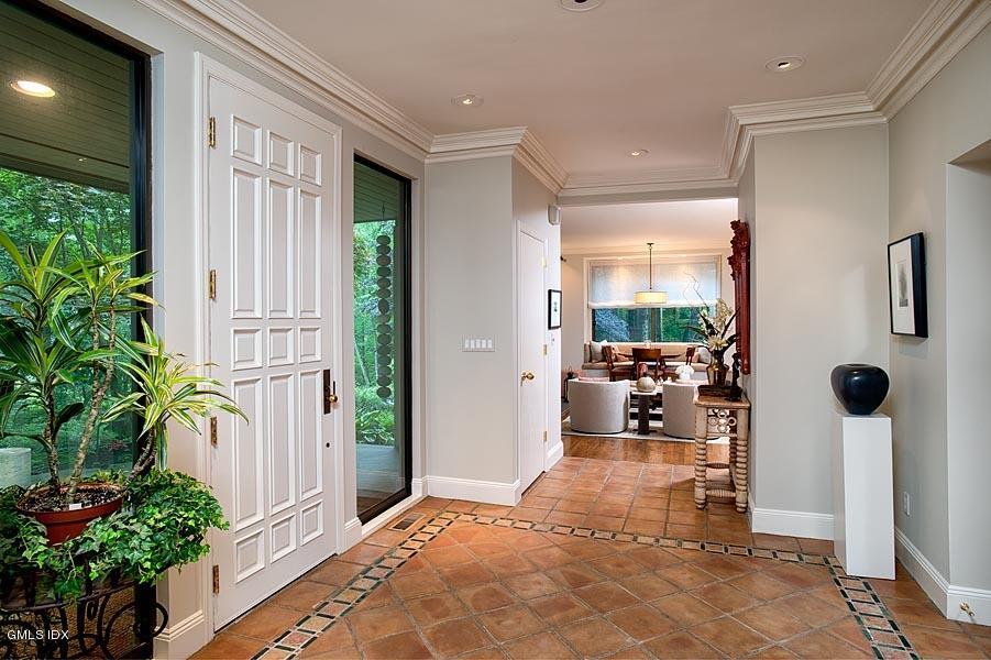 163 Clapboard Ridge Road Greenwich, CT 06831 - Photo 3 of 17 a living room with furniture and a potted plant