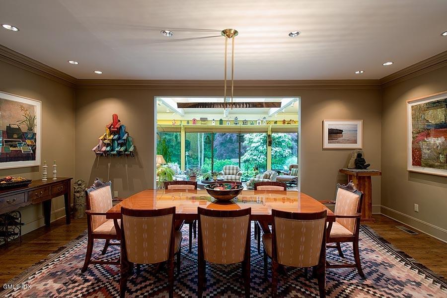 163 Clapboard Ridge Road Greenwich, CT 06831 - Photo 5 of 17 a dining room with furniture a chandelier and wooden floor