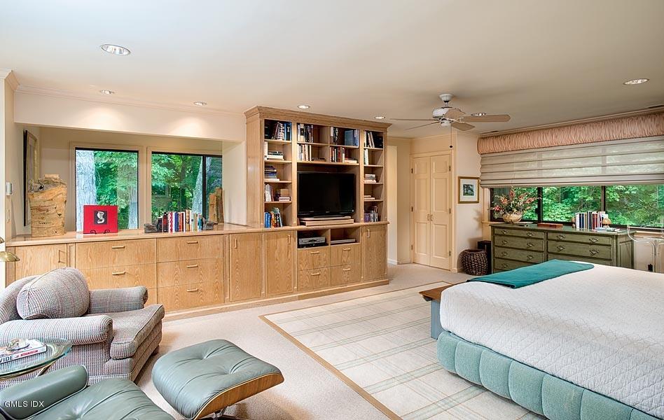 163 Clapboard Ridge Road Greenwich, CT 06831 - Photo 9 of 17 a living room with furniture and a flat screen tv