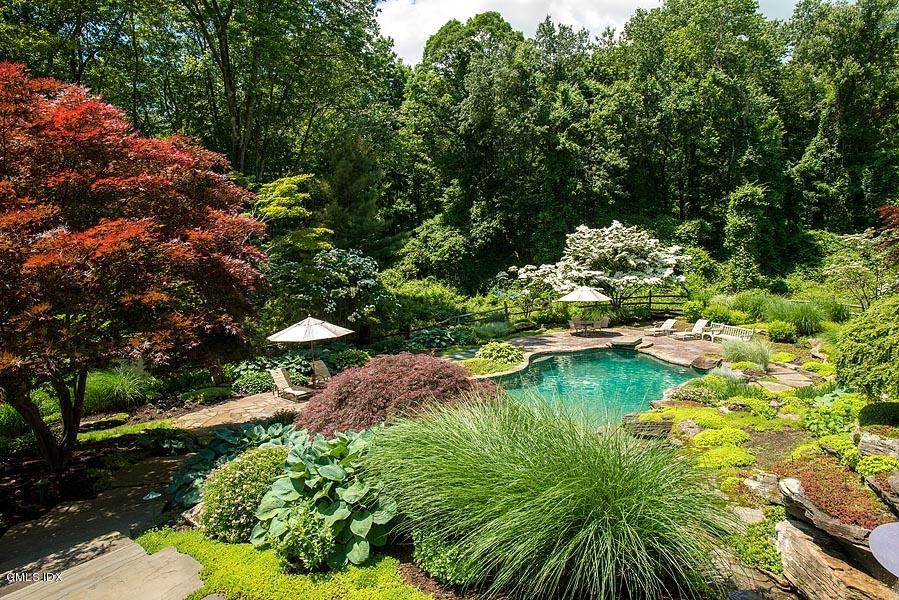 163 Clapboard Ridge Road Greenwich, CT 06831 - Photo 10 of 17 a view of a lake with green space