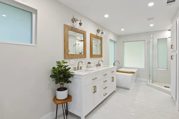 a bathroom with a sink and shower