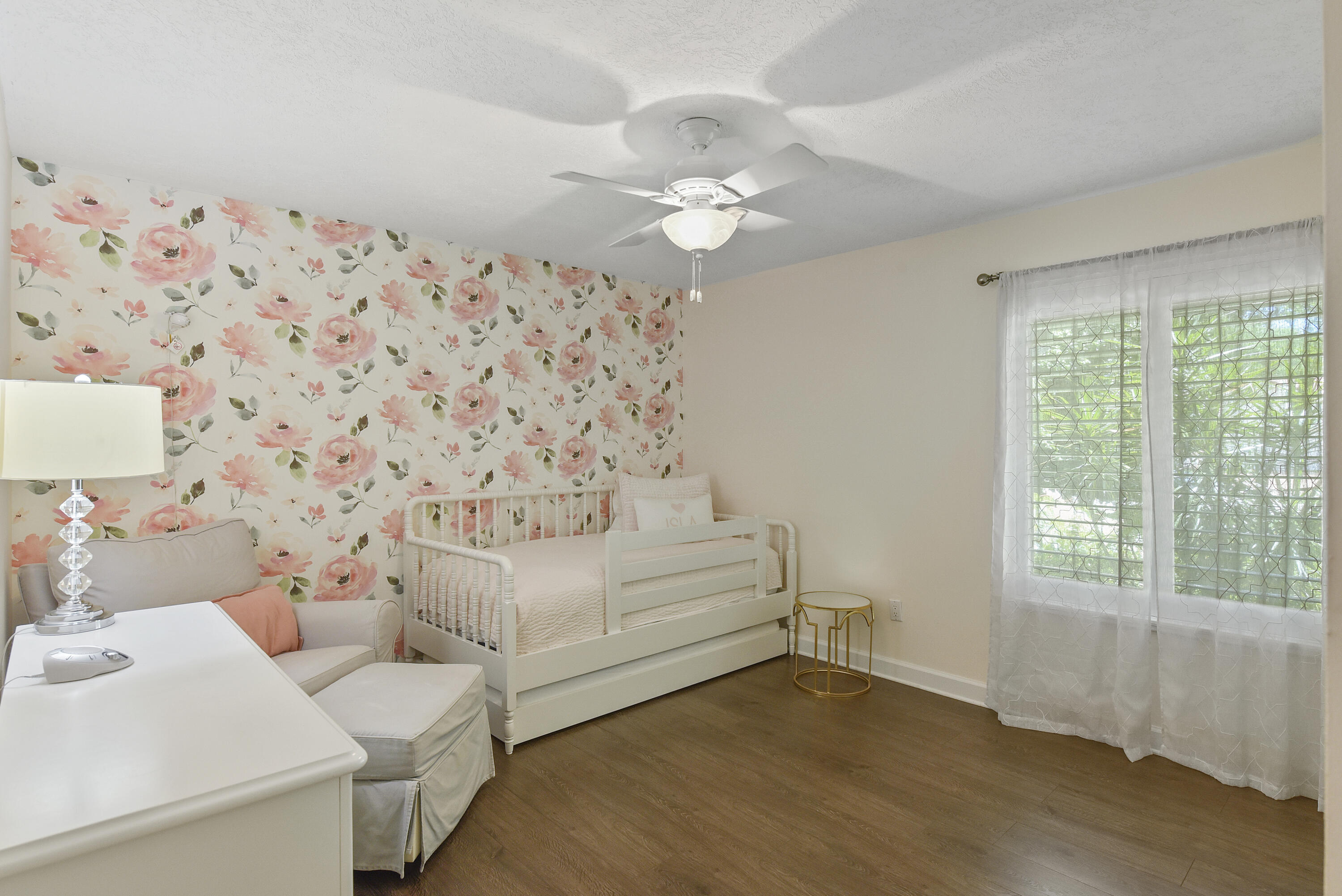 2659 Northwest 26th Circle Boca Raton, FL 33431 - Photo 19 of 34 a living room with furniture and a large window