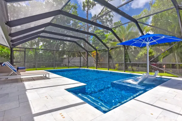swimming pool with outdoor seating