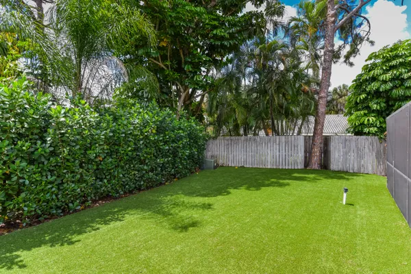 a view of a backyard with a garden