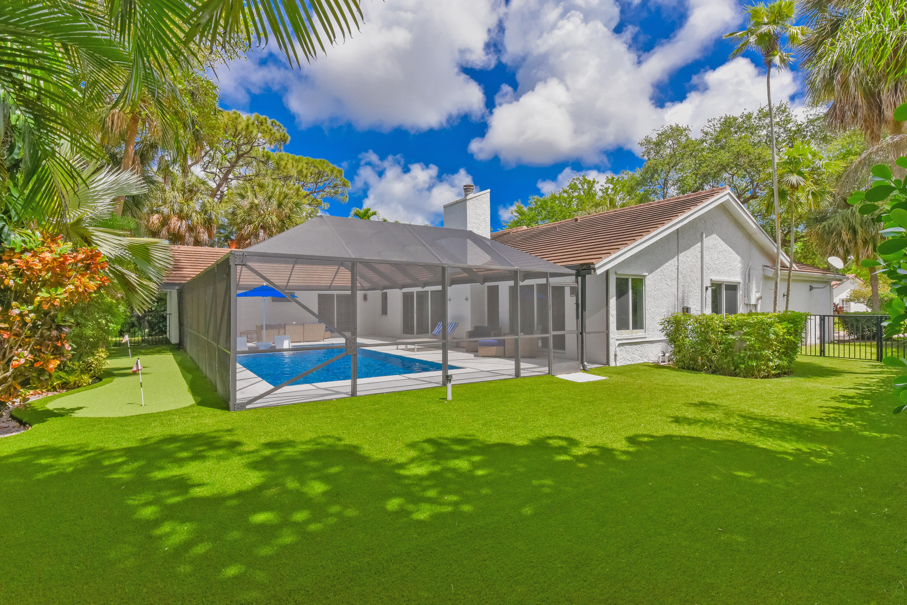 2659 Northwest 26th Circle Boca Raton, FL 33431 - Photo 33 of 34 a house that has a big yard