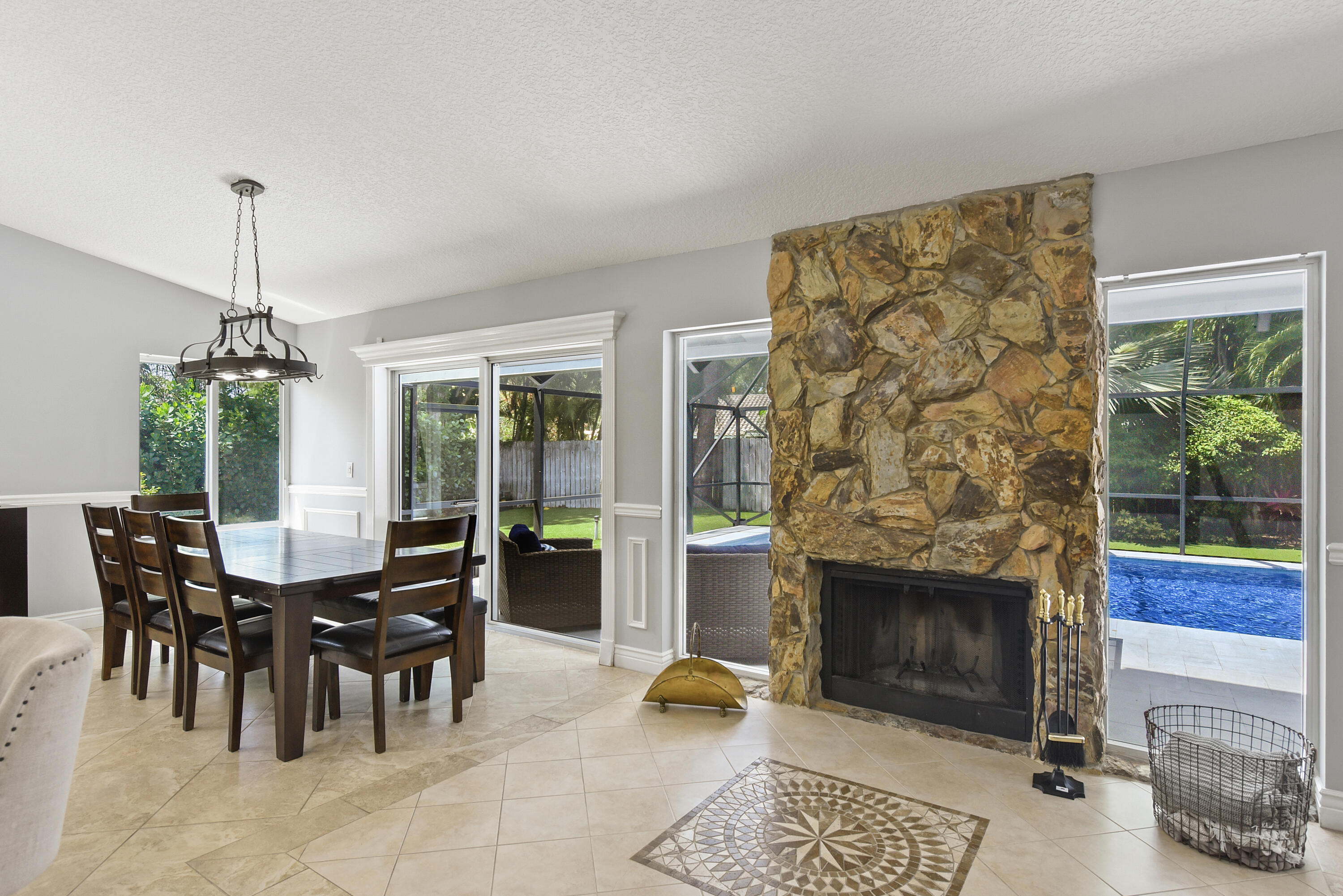 2659 Northwest 26th Circle Boca Raton, FL 33431 - Photo 10 of 34 a view of a livingroom with furniture and floor to ceiling window