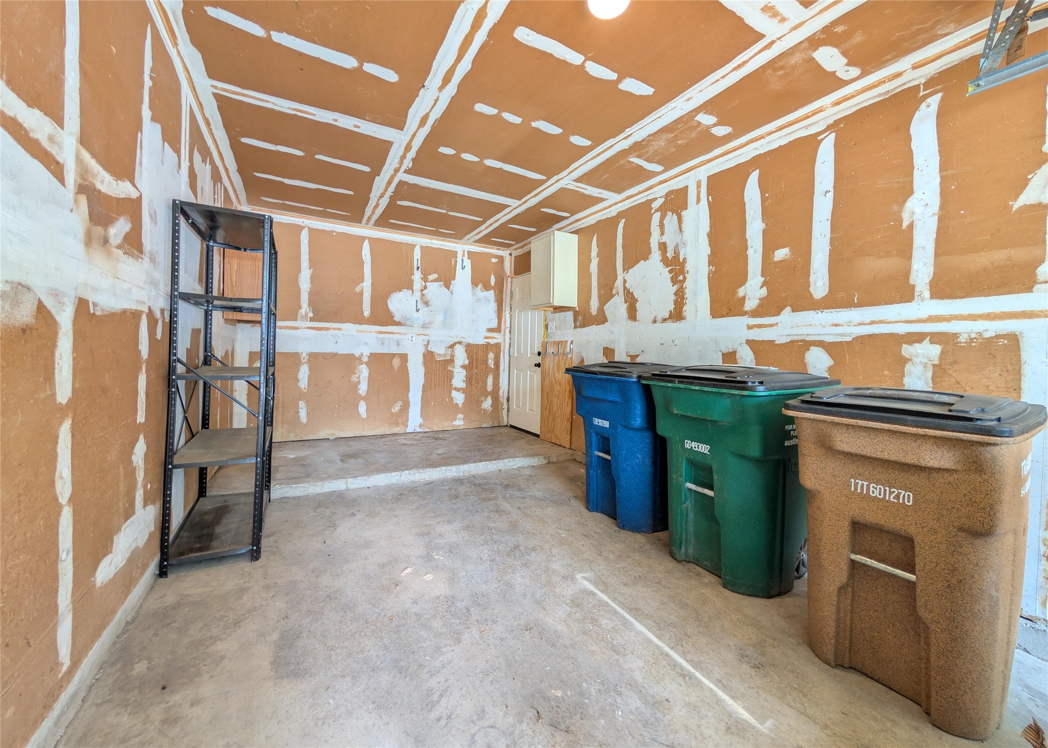 12601 Turtle Rock Road, Unit B Austin, TX 78729 - Photo 18 of 20 Single door garage. Manual open/close with lock.