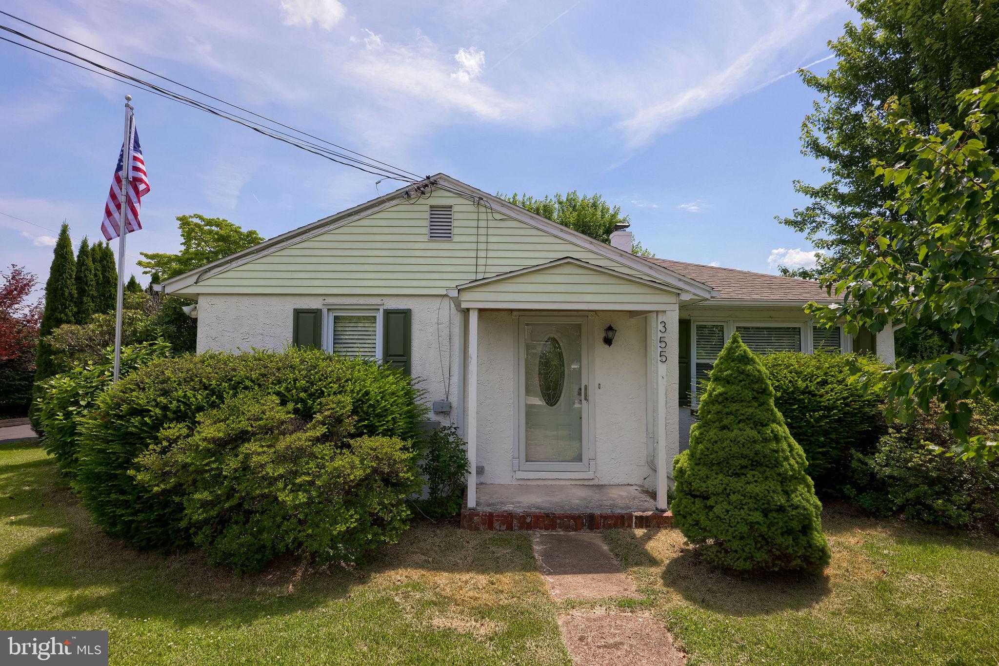 355 Harry Road Coatesville, PA 19320 - Photo 6 of 48 Charming home with lush greenery.