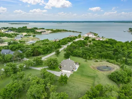 a view of a lake with a city